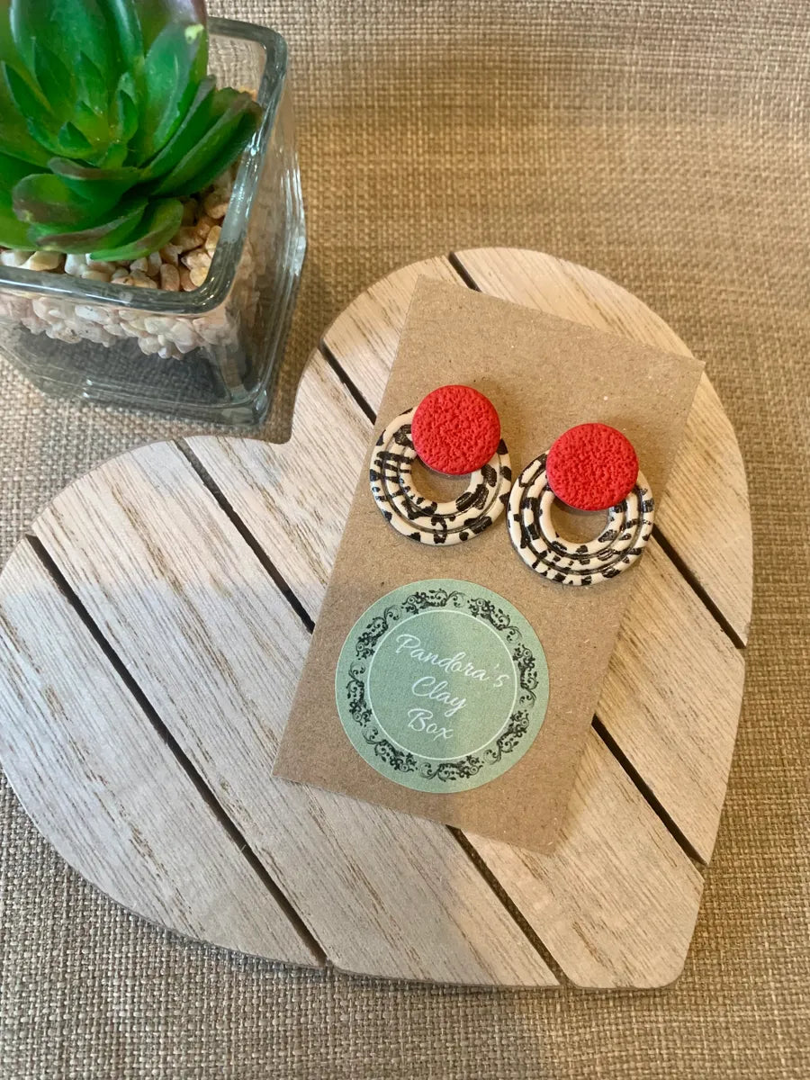 Red leopard statement studs