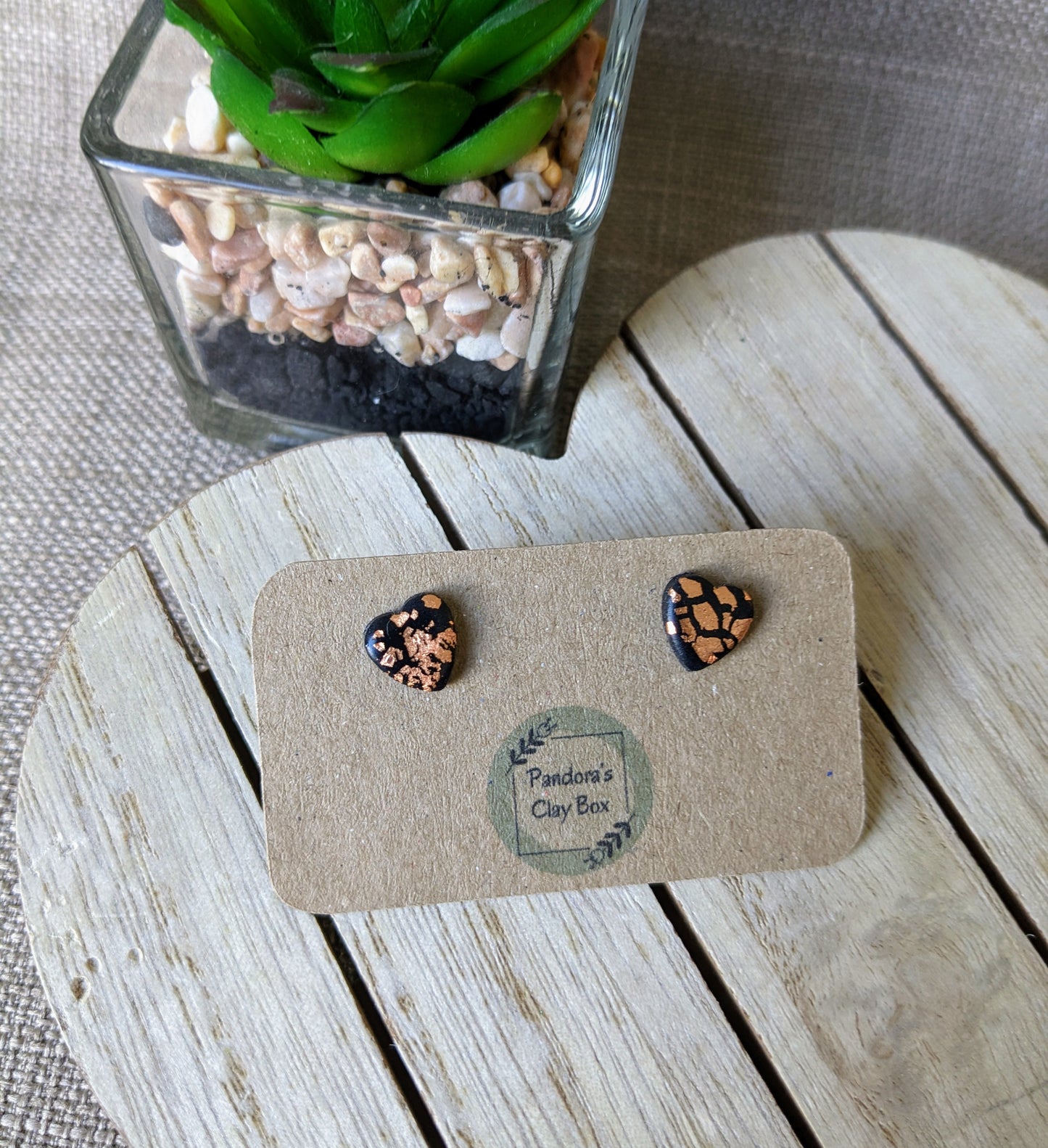 black/rose gold heart studs