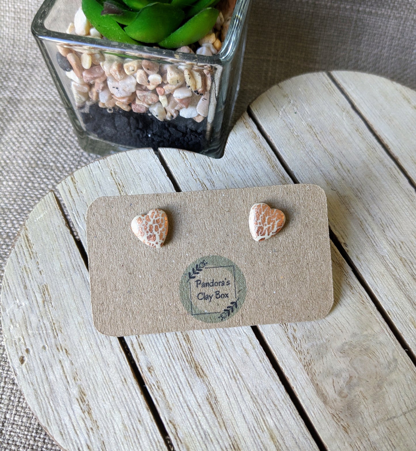 Nude/rose gold heart studs